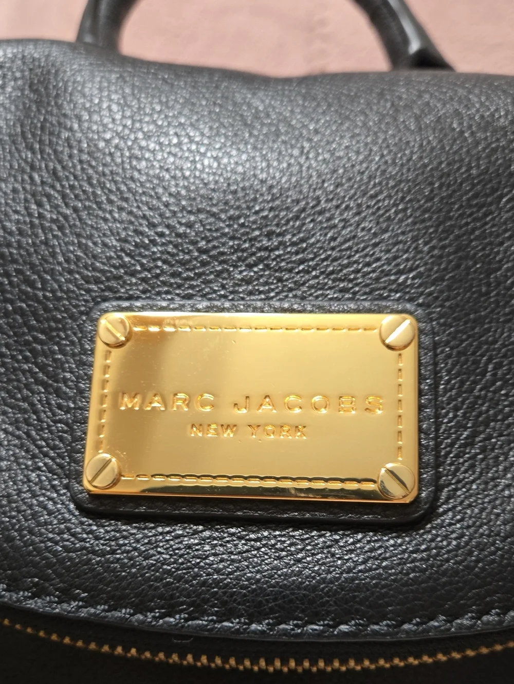 Marc Jacobs Black Leather Backpack with Gold Plaque